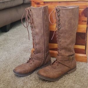 Knee high lace up boots